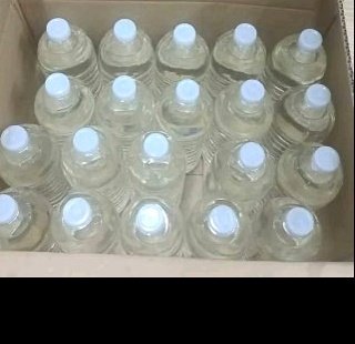 Pure Virgin Coconut Oil bottles packaged in export cartons